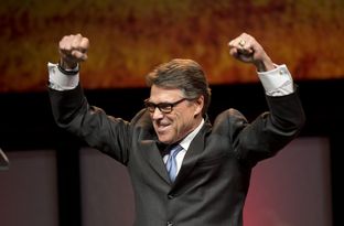 Texas Gov. Rick Perry woos the Republican crowd in Fort Worth on June 5, 2014.