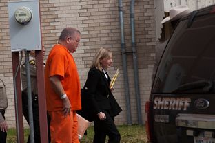 Bernhardt "Bernie" Tiede exits the Panola County Court building with his attorney Jodi Cole after his hearing on Feb. 5, 2014 in Carthage. A state district judge agreed to release Tiede in May, 17 years into his life sentence.