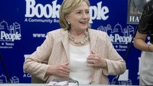 Former Secretary of State Hillary Rodham Clinton readies for the onslaught of book patrons at BookPeople on June 20, 2014.