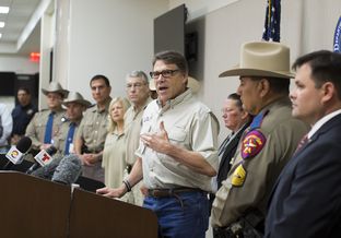 Gov. Perry and DPS Director Steve McCraw, speak to media following a tour to a federal facility housing unaccompanied alien children in Weslaco, Texas June 23rd, 2014. The state is providing $1.3 million per week to commence surge operations to help combat crime along the border.