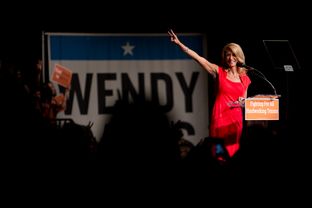 Wendy Davis addresses her supporters at the filibuster anniversary celebration hosted by her campaign.