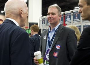 Republican activist Michael Quinn Sullivan visits at the State Republican Convention trade show on June 6, 2014.