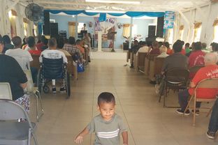 “Junior” Silva walks through the chapel and the Senda de Vida immigrant shelter in Reynosa, Tamaulipas on August 24, 2014.