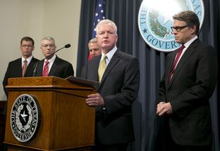 Texas Task Force on Infectious Disease Preparedness and Response Director Dr. Brett Giroir during a press conference at the Texas State Capitol on October 17th, 2014 joined by Gov. Perry, Dr. Kyle Janek, Col. Steve McCraw and Chief Nim Kidd