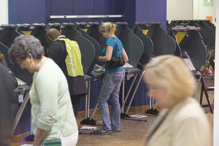 Texans cast their ballots at the Highland Mall mega-center voting site on Nov. 4, 2014.