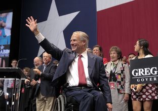 Attorney General Greg Abbott, who was elected Texas governor, waves to supporters after his victory speech in Austin on Nov. 4, 2014.