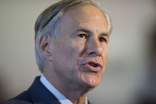Greg Abbott talks to reporters at the Texas Capitol on Nov. 5, 2014, the day after he was elected governor.