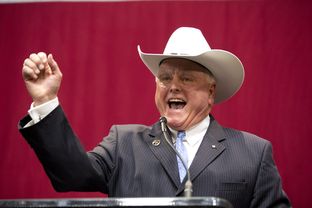 New Texas Agriculture Commissioner Sid Miller does a fist pump on election night Nov. 4, 2014.