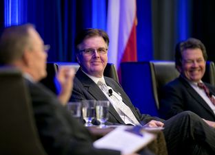 Lt. Gov.-elect Dan Patrick listens to Kent Grusendorf at a session of the Texas Public Policy Foundation's policy orientation on Jan. 7, 2015.