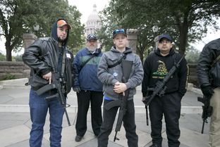 Activists who support a legislative proposal that would lift the state's handgun licensing requirements stand outside the state Capitol on the opening day of the Texas Legislature on Jan. 13, 2015.