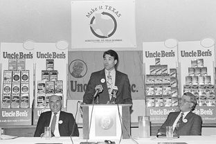 Rick Perry in 1991 at Uncle Ben's rice offices in Houston to promote his Make It Texas initiative. The program was designed to promote the agricultural processing industry with loan guarantees, but a high failure rate sank the program and triggered a $14.7 million bailout in 2009.