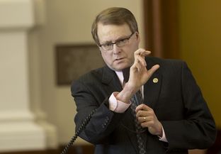 Sen. Brian Birdwell, R-Granbury, listens during a debate over Senate Bill 11 on March 18, 2015.