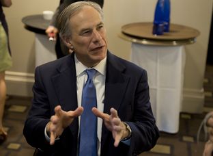 Gov. Greg Abbott speaks to reporters at  Texas Public Policy Foundation's grand opening of new building on April 21st, 2015