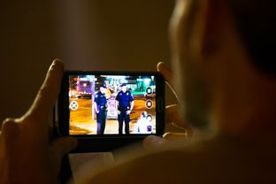Steve Donahue, of the Peaceful Streets Project, filmed law enforcement during a public intoxication near the University of Texas at Austin on April 24, 2015.