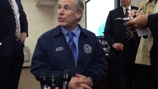 Gov. Greg Abbott speaks to reporters at the Security Operations Center at the Department of Public Safety on May 12, 2015.