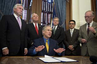 Gov. Greg Abbott discusses HB40 with the press prior to its ceremonial signing in the Governor's Reception Room on May 18, 2015. The bill gives the state exclusive control over regulation of oil and gas operations, and preempting local laws against fracking.