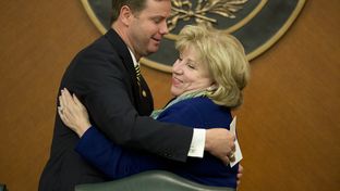 State Rep. Trent Ashby, R-Lufkin, and Chairman Sen. Jane Nelson, R-Flower Mound, embrace prior to Wednesday's Joint Committee on Appropriations discussing the state budget May 20, 2015.