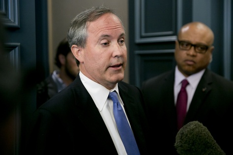 Texas Attorney General Ken Paxton speaks to media after keynoting a June 2015 event hosted by the Texas Public Policy Foundation regarding impact of the EPA's Clean Power Plan.