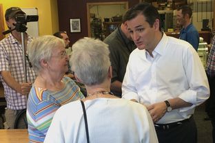 U.S. Sen. Ted Cruz, R-Texas, talks to Iowans at a bakery in Orange City. The 2016 presidential candidate visited the early-vote state Friday.