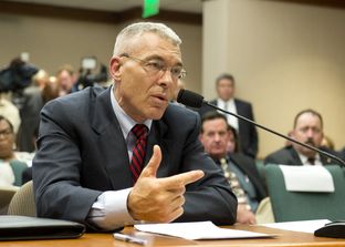 DPS Director Col. Steve McCraw answers questions from State Rep. Garnet Coleman during invited testimony of the House Committee on County Affairs investigating the Sandra Bland death in Waller County on July 30, 2015.