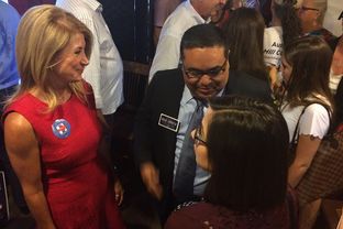 Former Democratic gubernatorial candidate Wendy Davis greets supporters after holding an event Wednesday in Austin to endorse Hillary Clinton for president. Davis said Clinton, the former secretary of state, holds Texas in a "very dear place in her heart."