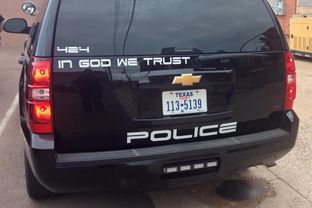The Childress Police Department recently began displaying "In God We Trust" on its patrol vehicles.