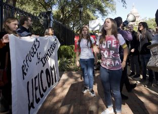 Rally in front of the Governor's Mansion to protest Gov. Abbott's decision not to accept at Syrian refugees on November 22, 2015