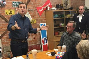 U.S. Sen. Ted Cruz, left, speaks at a campaign event on Nov. 28, 2015, in Iowa as U.S. Rep. Louie Gohmert, far right, looks on.
