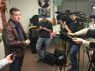 U.S. Sen. Ted Cruz speaks with reporters during an event in Iowa on Nov. 28, 2015.