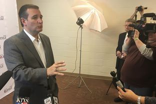 Presidential contender Ted Cruz speaks to the press in Cisco, Texas on Dec. 29, 2015.