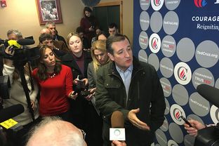 Presidential candidate Ted Cruz talks to the press in Manchester, Iowa on Monday, Jan. 25, 2016.