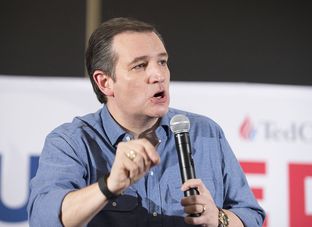 U.S. Sen. Ted Cruz speaks Wednesday in Iowa about his debate challenge to Republican presidential rival Donald Trump. During a rally in West Des Moines, Cruz said Trump is trying to avoid scrutiny of a record that does not match his rhetoric.