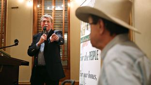 Former state Rep. Lon Burnam, a candidate for the Texas Railroad Commision, thanks Jim Hightower at his campaign kickoff at Scholz Garten on January 28, 2016.