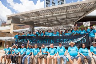 Austin Uber drivers participate in a rally against the proposal set by the Austin Transportation Department on Sept. 2, 2015.