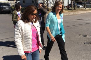 Hillary Clinton's national political director Amanda Renteria (right) canvasses neighborhoods in San Antonio on Feb. 8, 2016.