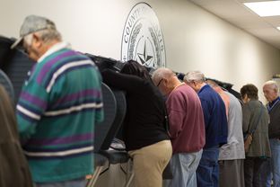 Travis County voters cast ballots at Travis County Tax Office on Feb. 25, 2016.