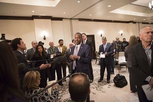 Retired neurosurgeon and presidential hopeful Ben Carson speaks to supporters in Irving, Texas on Feb. 27, 2106.