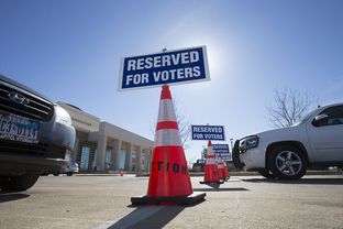 Reserved parking places awaited voters at the Hays County Government Center in San Marcos on Feb 25, 2016.