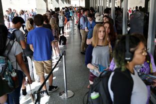 People stand in line to vote in the primaries at the Flawn Academic Center on the University of Texas campus on March 1, 2016.