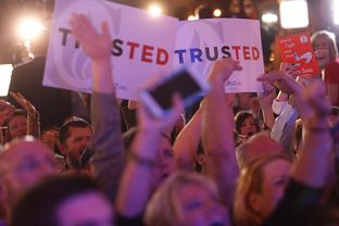 Supporters wait for U.S. Sen. Ted Cruz to take the stage at the Redneck Country Club in Stafford, Texas on the evening of the Texas primary on Mar. 1, 2016.