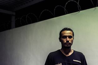 Milton Otoniel Lopez Chupin, from Santa Tecla Libertad, El Salvador, in the courtyard at the Casa del Migrante migrant shelter in Matamoros, Mexico, on Nov. 3, 2015.