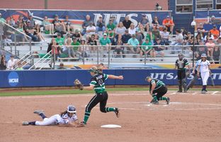 Bailee Baldwin of the University of Texas at San Antonio's softball team slid into second base as Kelli Schkade of the University of North Texas covered second during a recent game on March 12, 2016, in San Antonio.