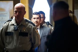 Former Texas Department of Public Safety Trooper Brian Encinia leaves court after his arraignment at the Waller County Courthouse in Hempstead, Texas Tuesday, Mar. 22, 2016.