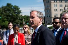 Texas Attorney General Ken Paxton holds a press conference on June 9, 2016 in front of the U.S. Supreme Court to discuss the filing of a lawsuit against the state of Delaware
