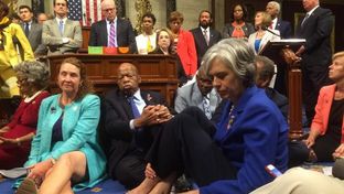 A photo shot and tweeted from the floor of the House by U.S. Rep. Katherine Clark, D-Massachusetts, shows Democratic House members staging a sit-in over gun legislation on Capitol Hill in Washington, D.C. on June 22, 2016.