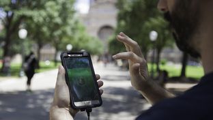 James Ratcliff, 39, plays "Pokémon Go" outside the Texas Capitol on Thursday. "We're trying to figure out if there are more people here playing than visiting the Capitol," he said. "We think there is."
