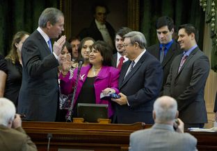 Lt. Gov. David Dewhurst swears in Sen. Leticia Van de Putte as president pro tempore of the Texas Senate on Jan. 8, 2013, the first day of the 83rd legislative session.