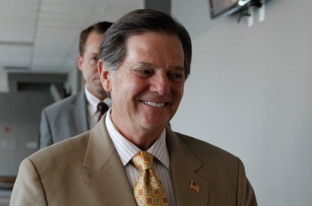 Former House Majority Leader Tom DeLay walks to the 331st District Court of Travis County during the August 2010 start of pre-trial hearings on corruption and money laundering charges against the former politician.