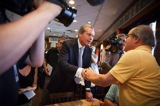Lt. Gov. David Dewhurst met voters on July 31, 2012, in a Houston deli on the day of the GOP primary runoff. Dewhurst lost the U.S. Senate primary runoff to Ted Cruz.