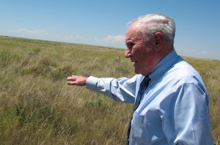 Lynn County Judge H.G. Franklin looks out over his land, which is enrolled in the federal Conservation Reserve Program.